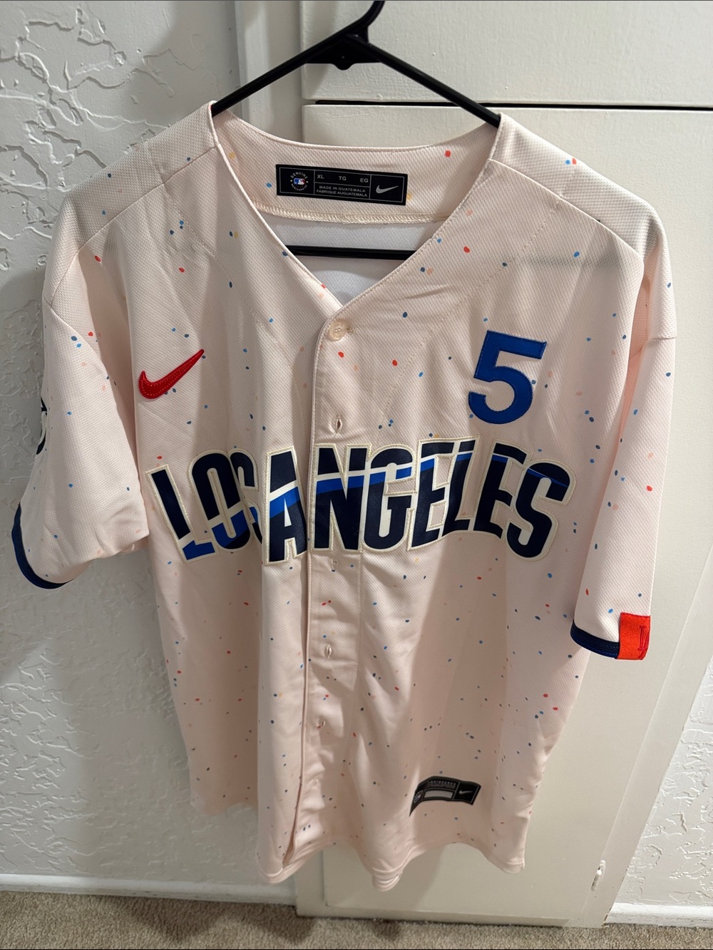 Nike Men's Cream Los Angeles Baseball Jersey with Blue and Red Accents